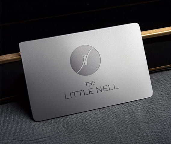 The Little Nell silvery key membership card.