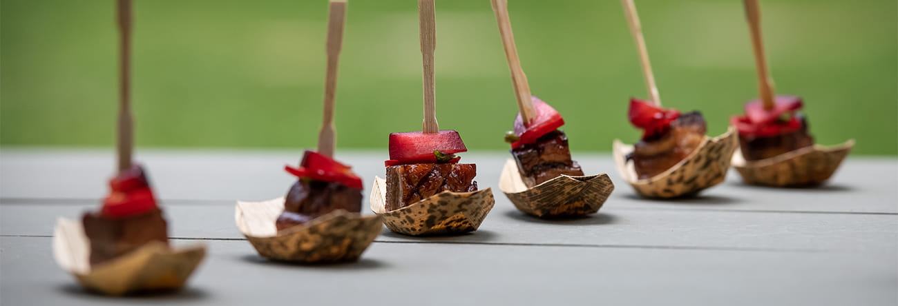 Canape skewers with steak and strawberries.