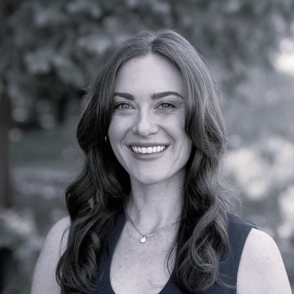 Black and white headshot of a woman