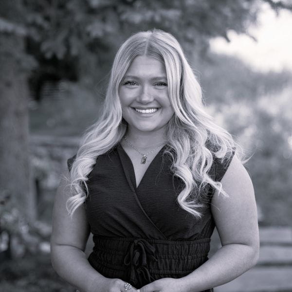 Black and white headshot of a woman
