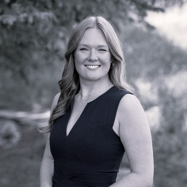 Black and white headshot of a woman
