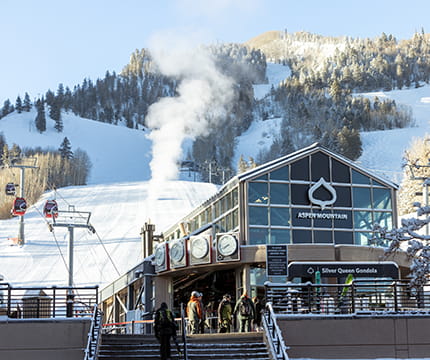 The Silver Queen Gondola at the base of Aspen Mountain in the winter.