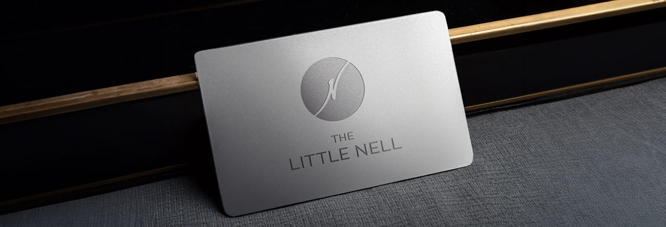 The Little Nell silvery key membership card.