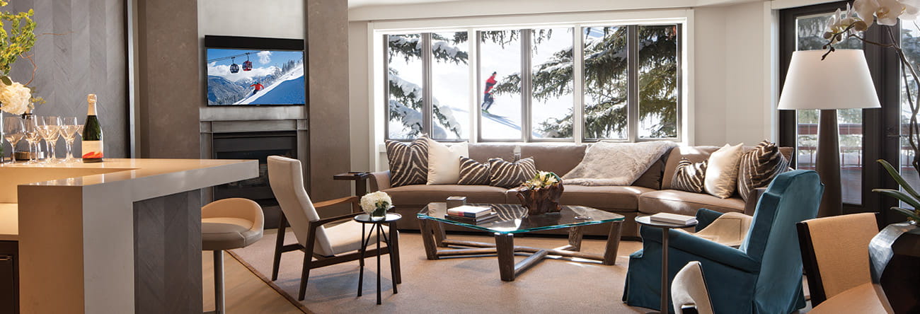 The Pfeifer Suite's lush living room and view of Aspen Mountain.