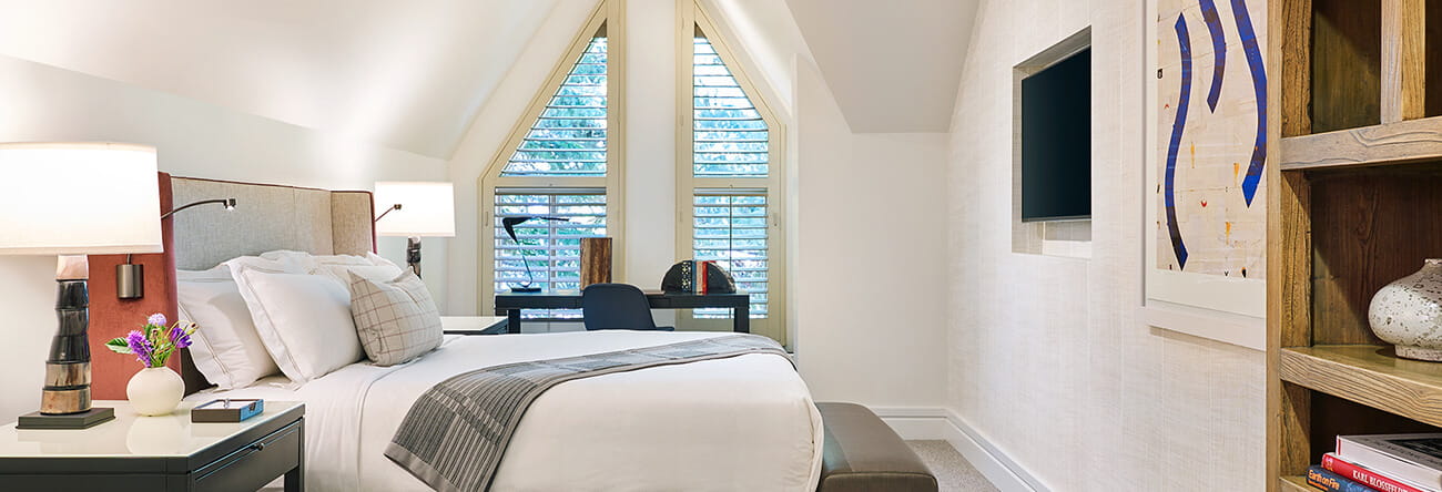 The master bedroom in a one bedroom town side suite at The Little Nell in Aspen.