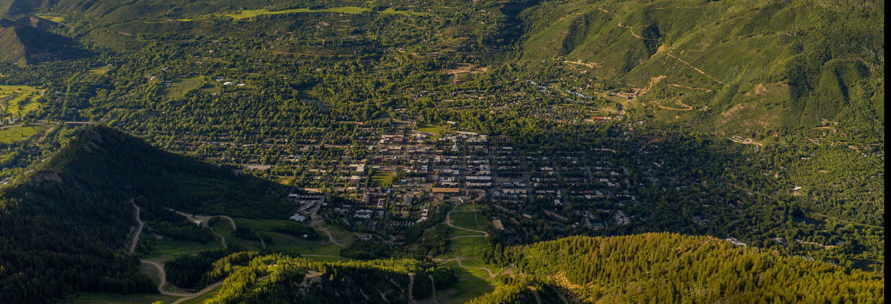 overlooking the town of aspen in the summer