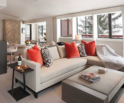 A spacious living room in a 5 star luxury suite in Aspen.