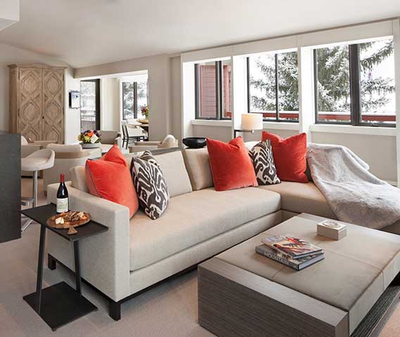 A spacious living room in a 5 star luxury suite in Aspen.