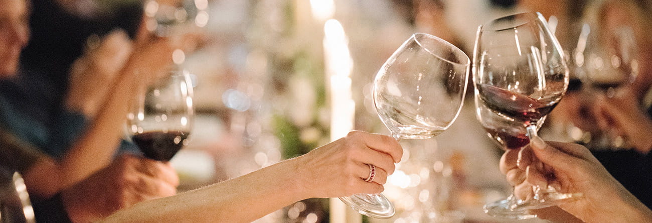 A wine glass cheers at an Aspen wine dinner.