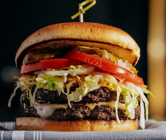 ajax tavern burger on table