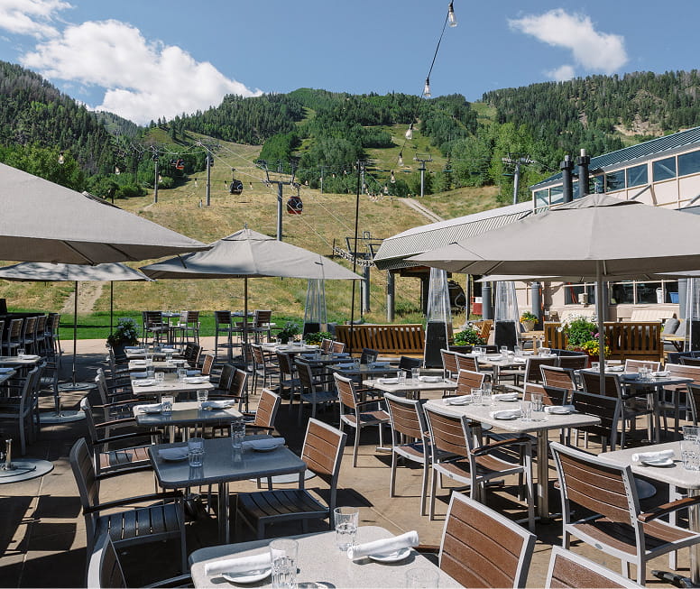 outdoor patio area at ajax at the base of aspen mountain in the summer