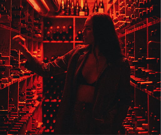 woman in wine cellar