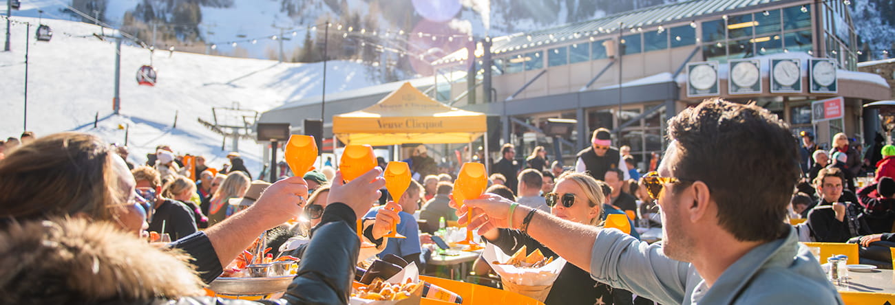 Ajax Tavern patrons cheers their glasses at the Clicquot in the Snow event.