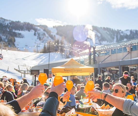 Ajax Tavern patrons cheers their glasses at the Clicquot in the Snow event.