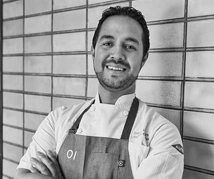 Headshot of Oscar Ibarra, Chef de Cuisine at Ajax Tavern