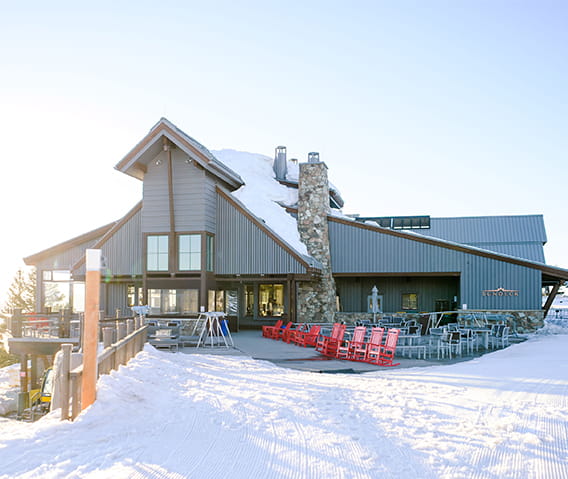 The Sundeck exterior in winter on top of Aspen Mountain