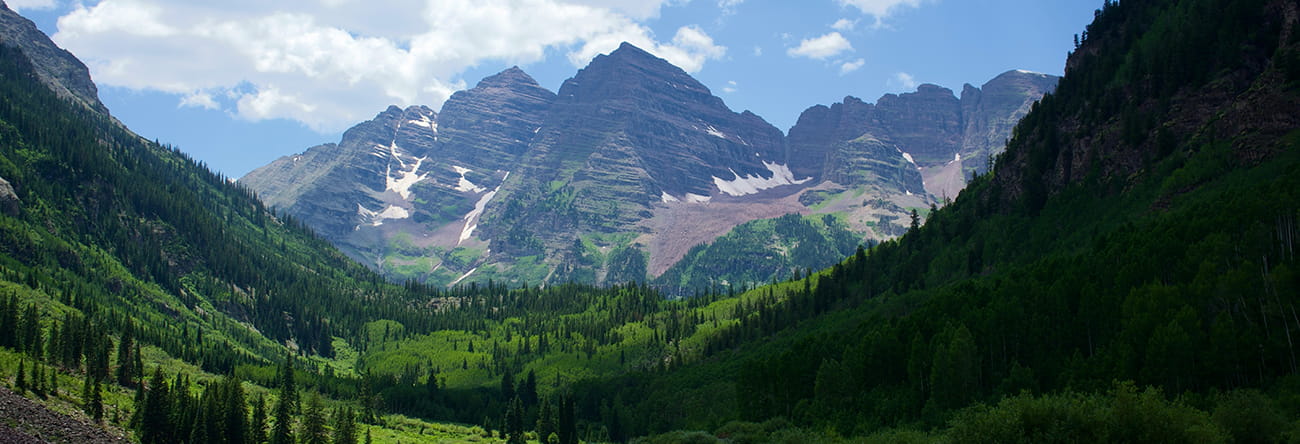 The iconic Maroon Bells peaks in the summertime.