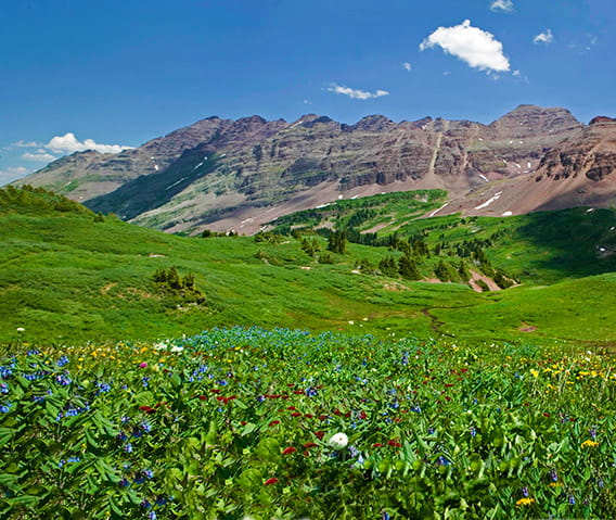 Participants in The Little Nell's photography workshop will learn how to capture stunning scenery like this view on West Maroon Pass near Aspen.