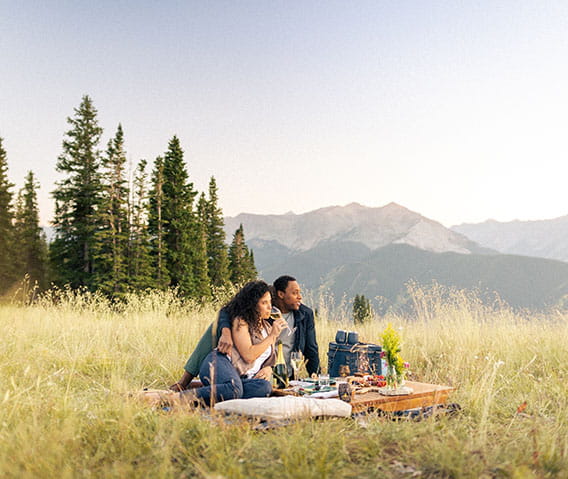 Couple picnicking on Aspen Mountain in the summer