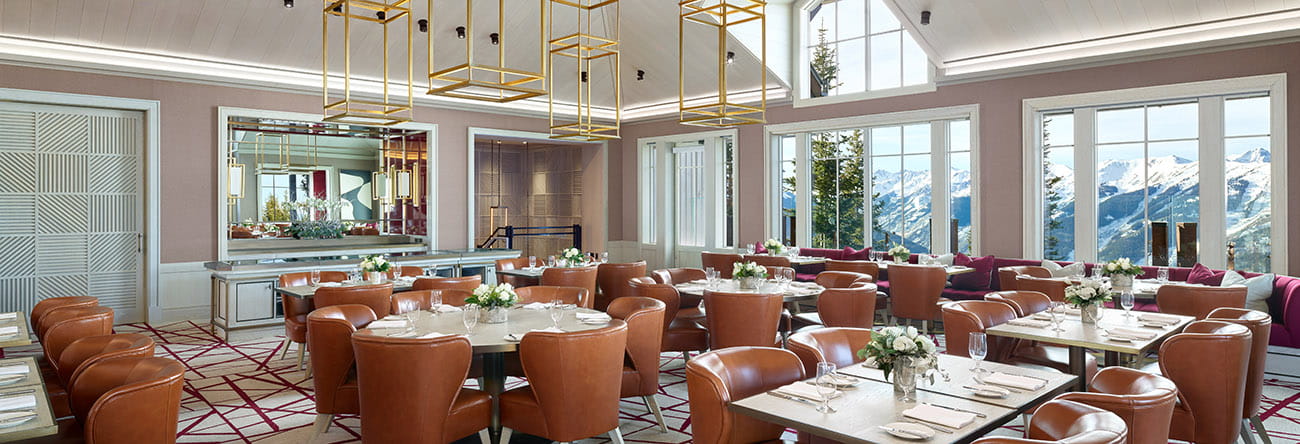The ASPENX Mountain Club wedding reception venue with a dining room and mountain views.