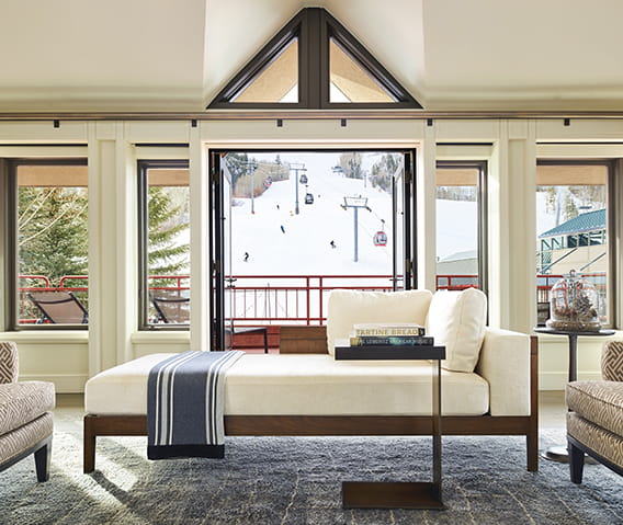 view of skiers from room