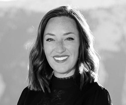 Black and white headshot of Senior Event Sales Manager, Casarae Clark Reveal.