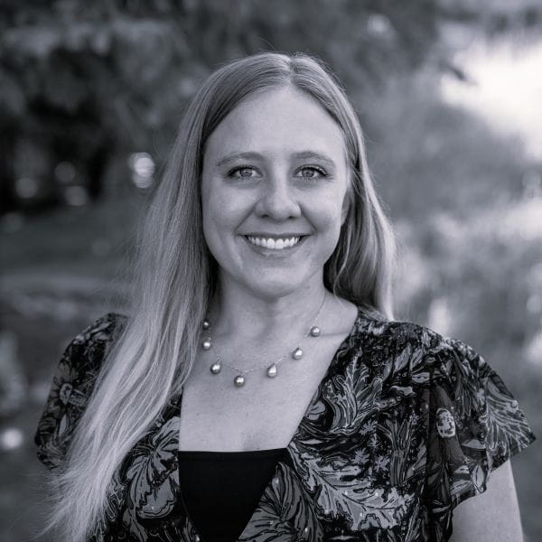 Black and white headshot of a woman