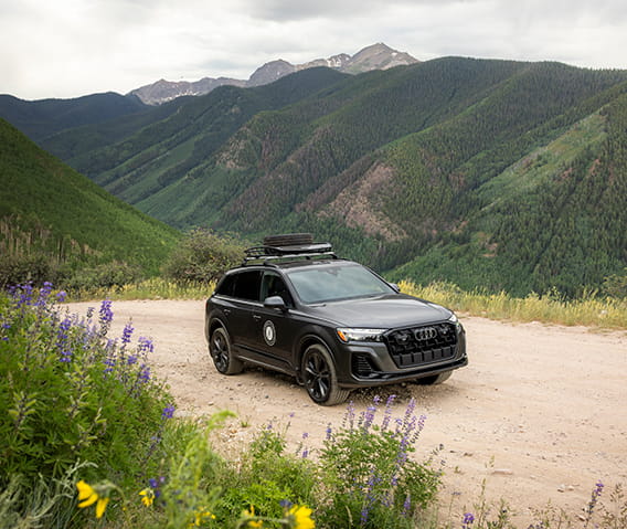 audi driving on mountain road