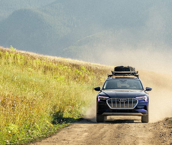 audi car driving on mountain road