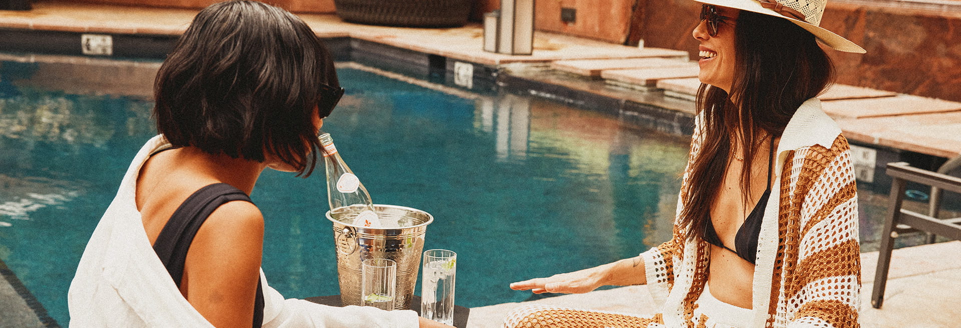 two women by the pool