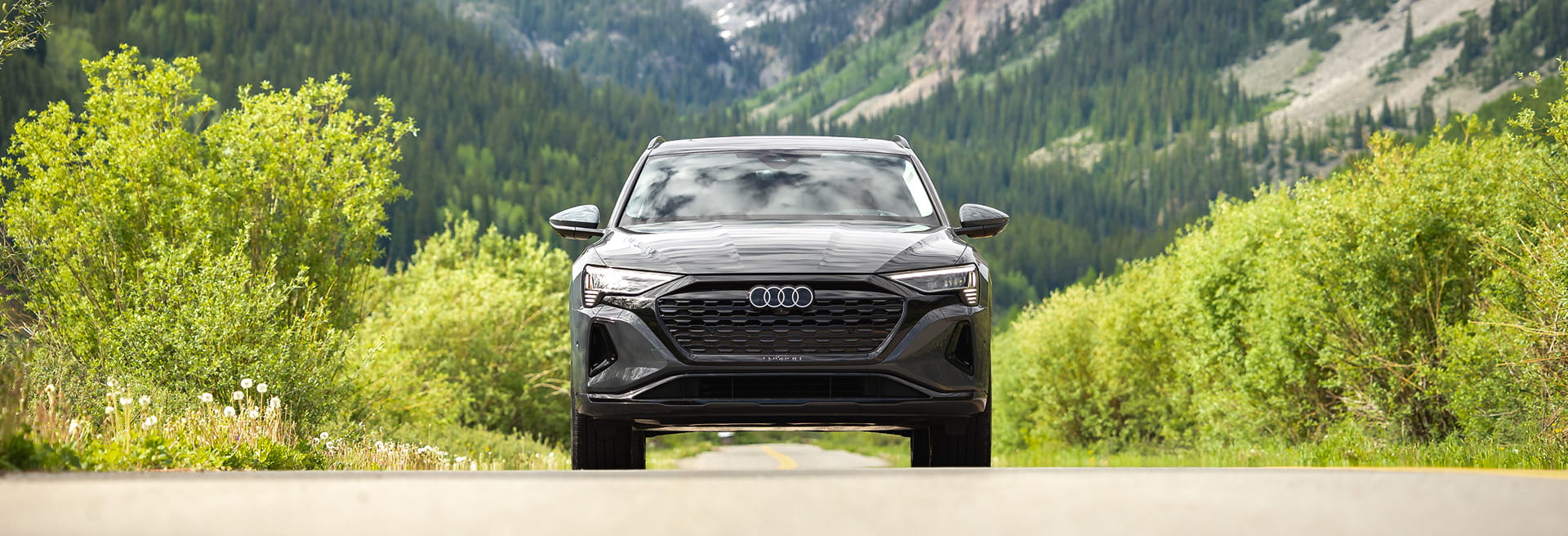 audi car driving in mountains