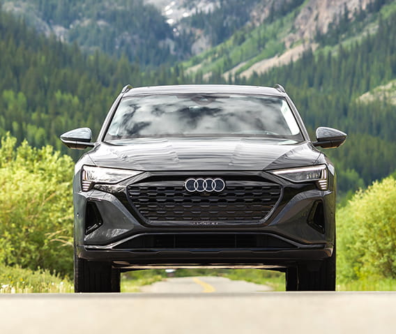 audi car driving in mountains
