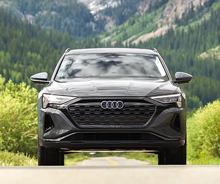 audi car driving in mountains