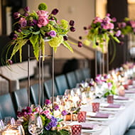 Flower arrangements on a table in the Element 47 dining room