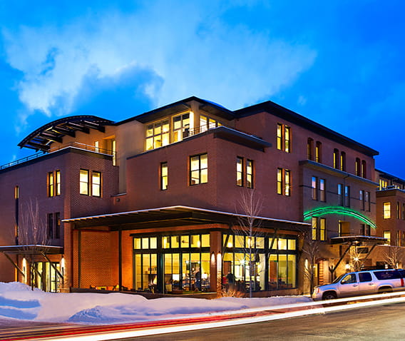 The Limelight Aspen Hotel in the winter at dusk