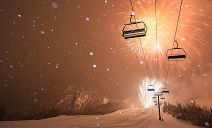 The Little Nell's New Year's Eve fireworks over the snow on Aspen Mountain.