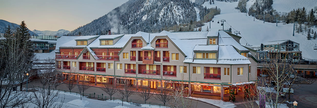 The snowy exterior of The Little Nell, a luxurious hotel in downtown Aspen, Colorado.