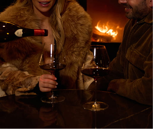 two woman drinking wine
