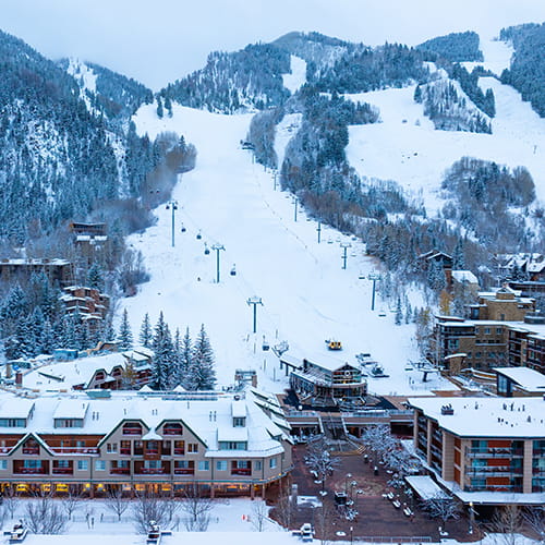 aerial view of the little nell and aspen mountain in the winter