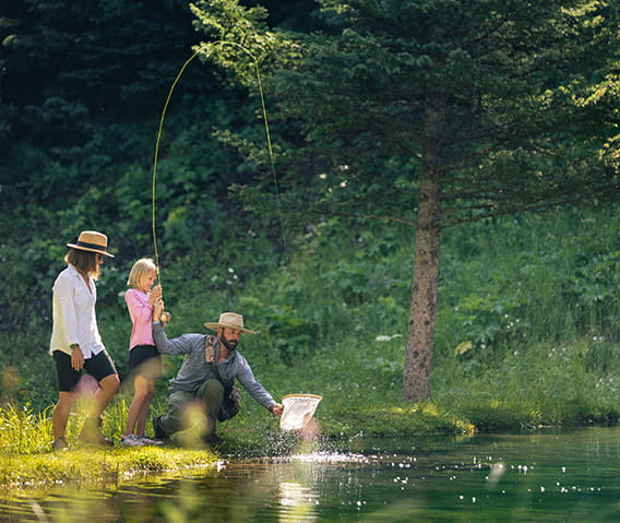 family fly fishing together