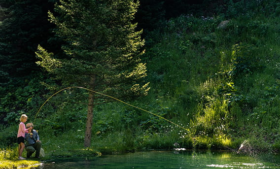 family fly fishing together