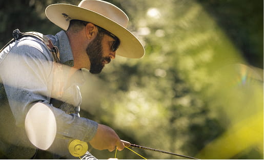 man fly fishing