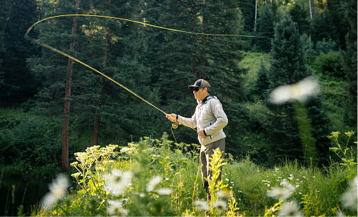 man fly fishing