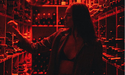 woman in wine cellar
