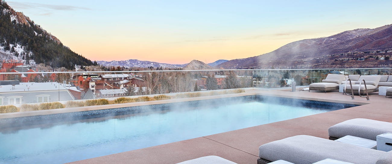 residences pool overlooking aspen mountains