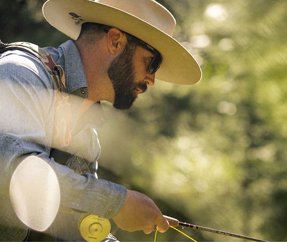 man fly fishing