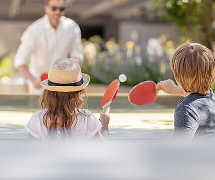 Click here to learn more about the rooftop garden deck at the Residences at The Little Nell, which offers activities for the whole family to enjoy such as a ping pong table.