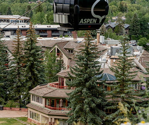 aspen gondola in front of the little nell building