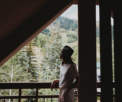 woman on hotel balcony