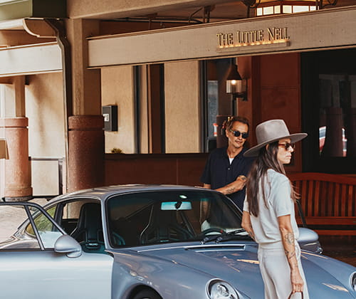 couple arriving at the little nell